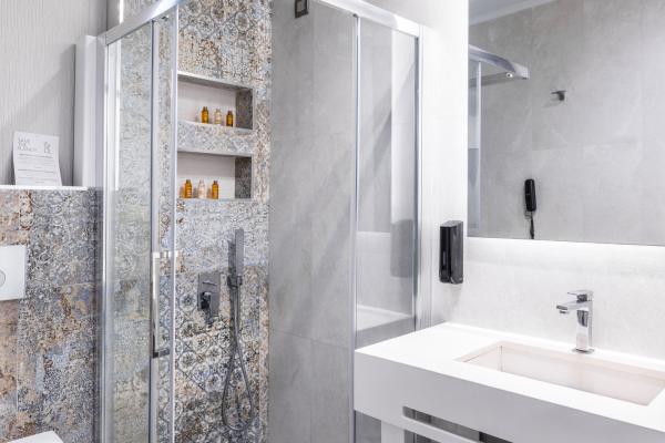 The Blue Carpet suite is one of the most luxurious suites. It features a large private pool and a fully furnished terrace with stunning sea views and lush gardens.