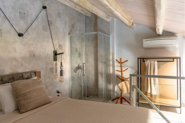 The interior minimal decoration with the thoughtful bohemian-chic details will create a sense of relaxation, serenity and tranquility and the spacious, fully furnished private terrace will create the right setting for delightful mornings and romantic sunsets.